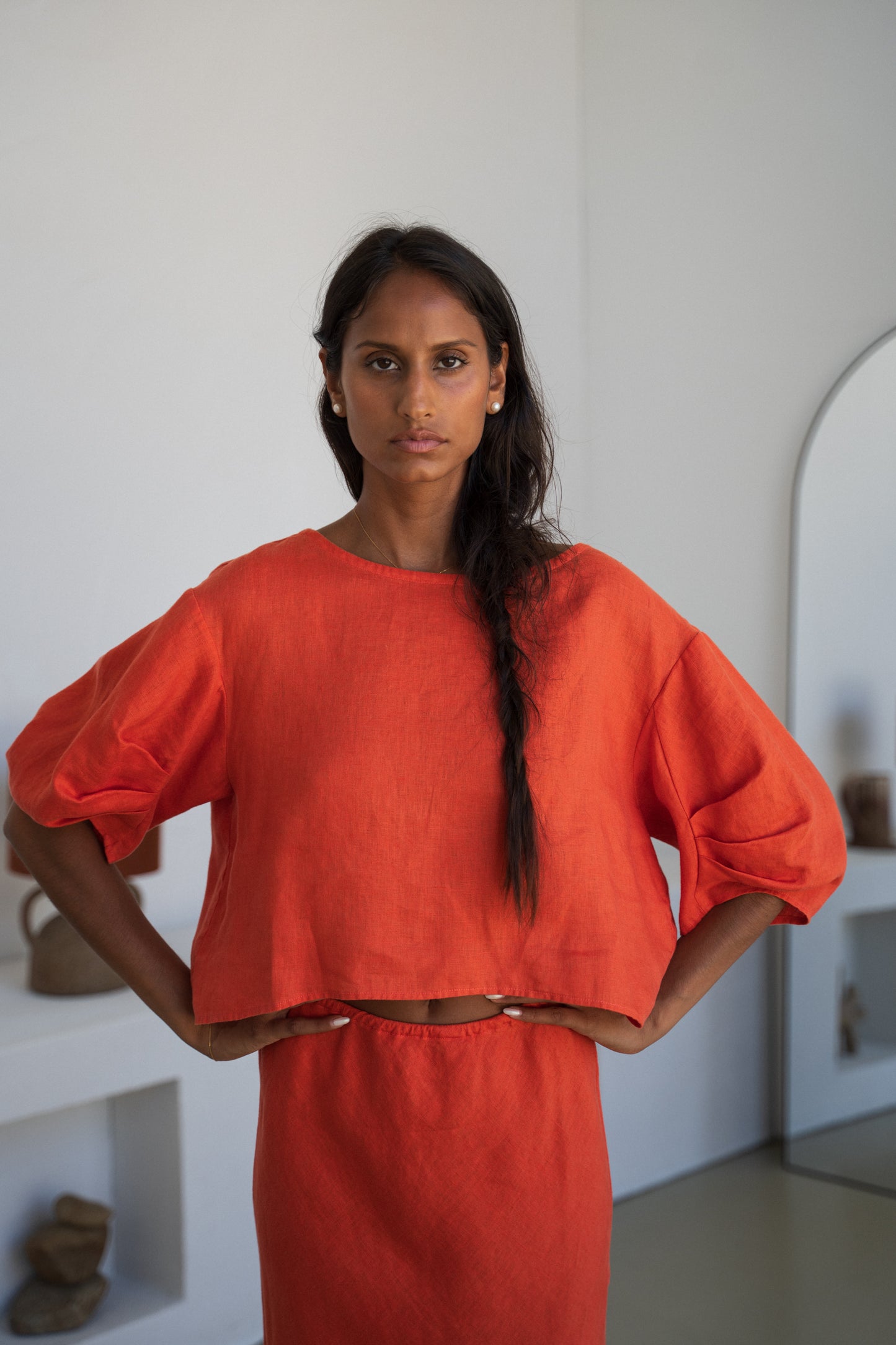 LILLY PILLY woman wearing Leia linen top in Spritz paired with Riley linen skirt